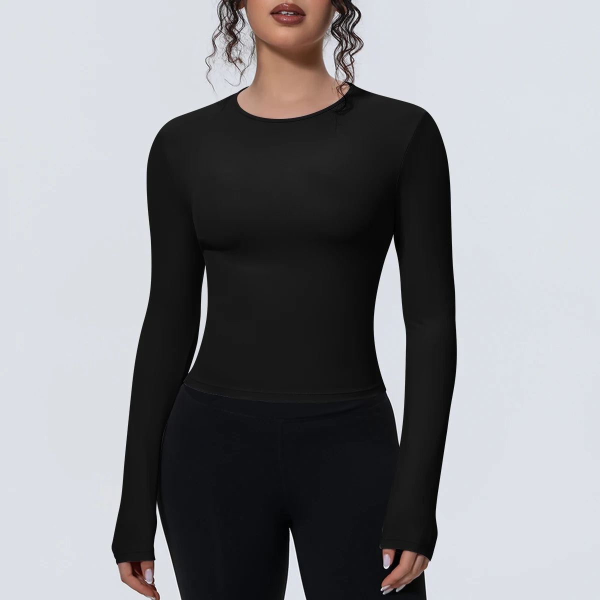 Camiseta de manga larga para mujer: ideal para yoga, gimnasio, deporte y running. Corte entallado, transpirable y de color liso.