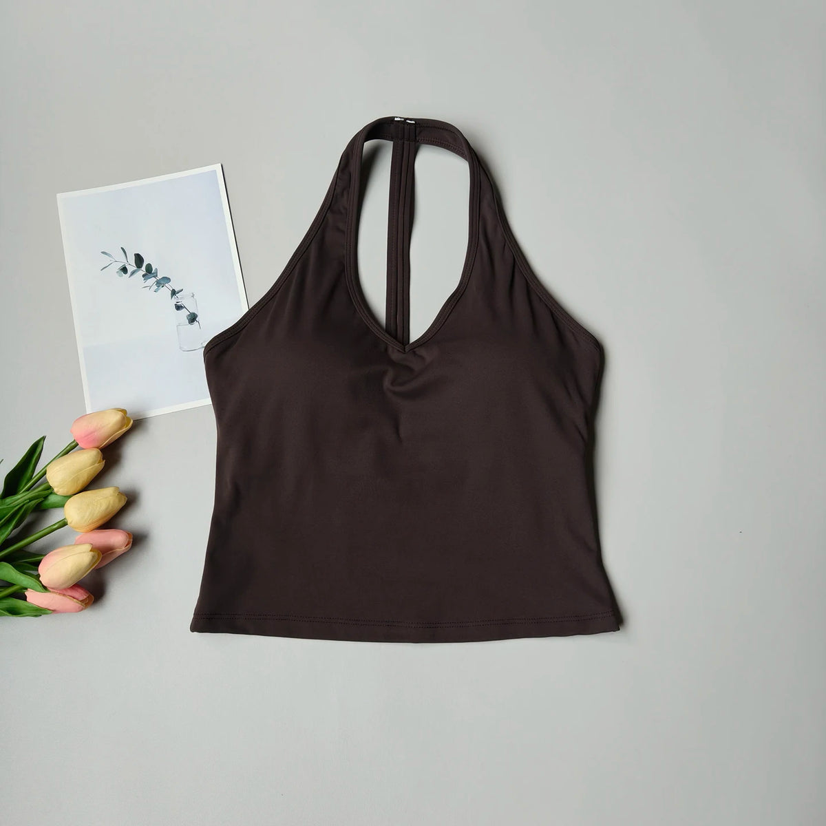 Sujetador deportivo para mujer con cuello en V y diseño halter, espalda atractiva y efecto push-up; ideal para yoga, gimnasio, running y fitness (resistente a impactos).