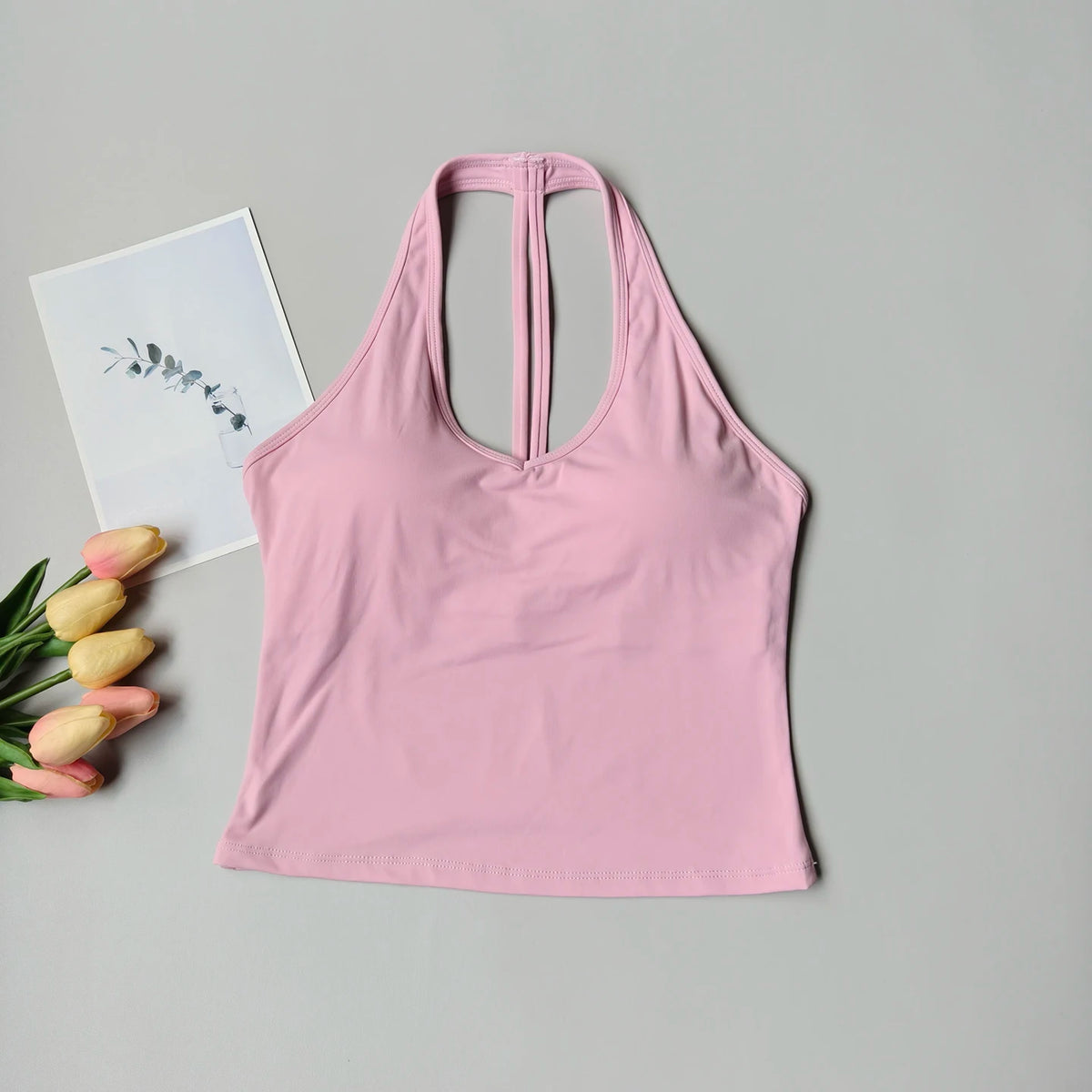 Sujetador deportivo para mujer con cuello en V y diseño halter, espalda atractiva y efecto push-up; ideal para yoga, gimnasio, running y fitness (resistente a impactos).