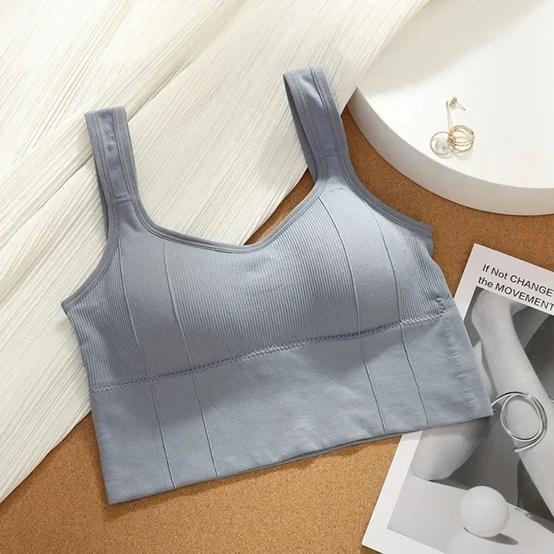 Top deportivo transpirable y antitranspirante para mujer: sujetador de yoga sin costuras, resistente a impactos, estilo crop top con efecto push-up para gimnasio y entrenamiento.