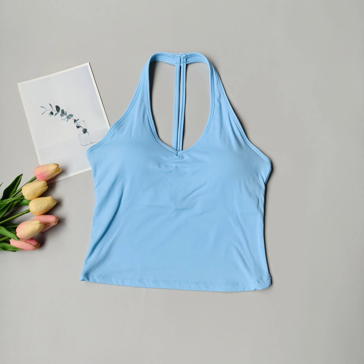 Sujetador deportivo para mujer con cuello en V y diseño halter, espalda atractiva y efecto push-up; ideal para yoga, gimnasio, running y fitness (resistente a impactos).