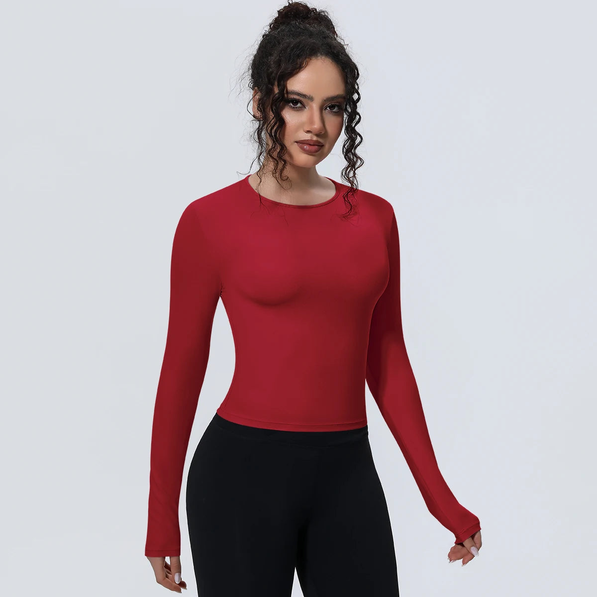 Camiseta de manga larga para mujer: ideal para yoga, gimnasio, deporte y running. Corte entallado, transpirable y de color liso.