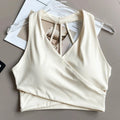Sujetador deportivo para mujer: sin costuras, con relleno, espalda descubierta, resistente a impactos y estilo crop top; ideal para yoga, gimnasio y fitness.