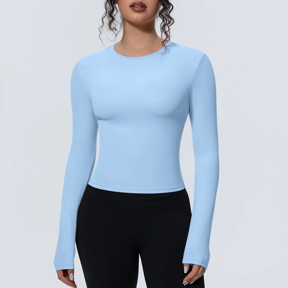 Camiseta de manga larga para mujer: ideal para yoga, gimnasio, deporte y running. Corte entallado, transpirable y de color liso.