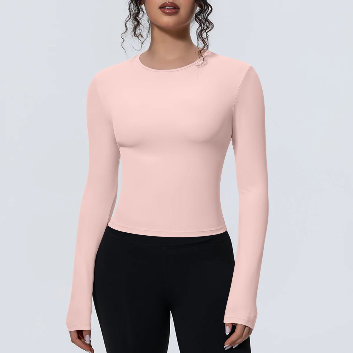 Camiseta de manga larga para mujer: ideal para yoga, gimnasio, deporte y running. Corte entallado, transpirable y de color liso.