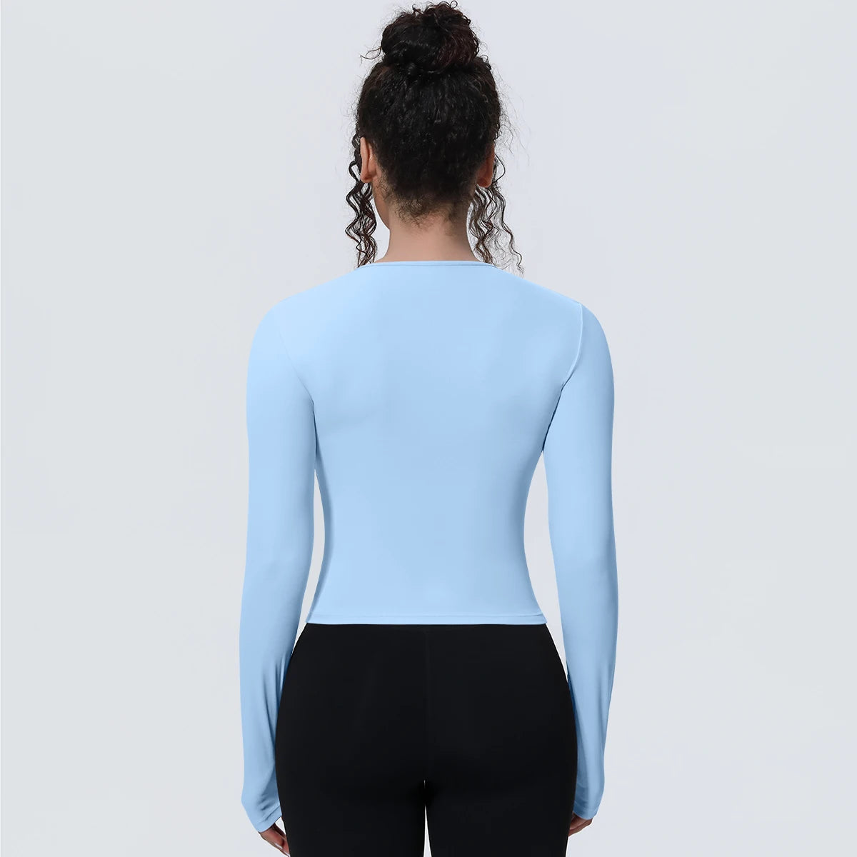 Camiseta de manga larga para mujer: ideal para yoga, gimnasio, deporte y running. Corte entallado, transpirable y de color liso.