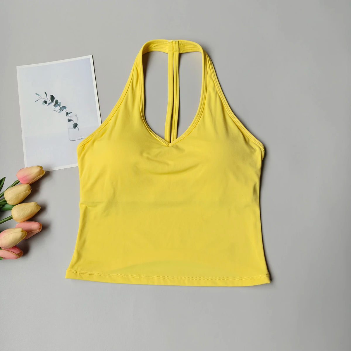 Sujetador deportivo para mujer con cuello en V y diseño halter, espalda atractiva y efecto push-up; ideal para yoga, gimnasio, running y fitness (resistente a impactos).