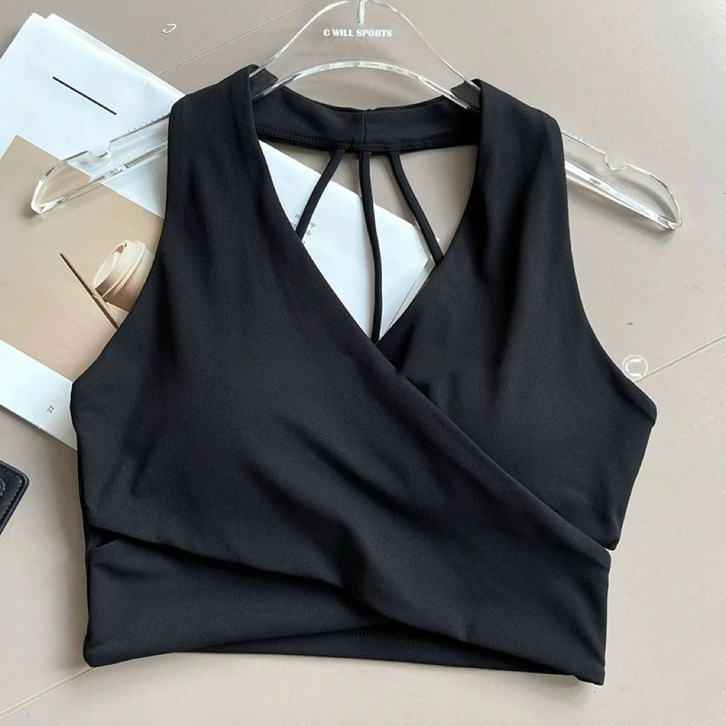 Sujetador deportivo para mujer: sin costuras, con relleno, espalda descubierta, resistente a impactos y estilo crop top; ideal para yoga, gimnasio y fitness.